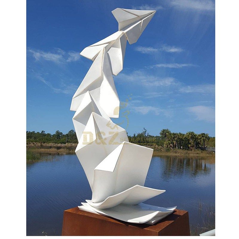 Stainless steel paper airplane sculpture