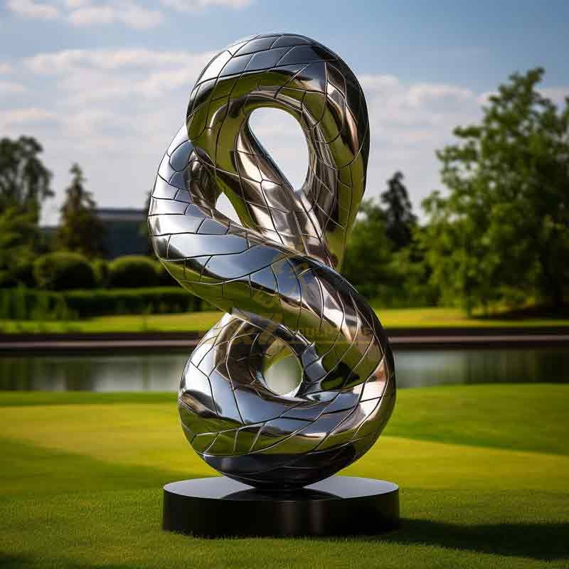 Large metal abstract cobra snake sculpture