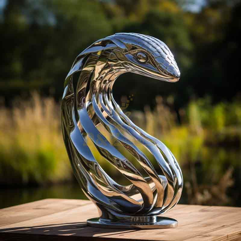 Large metal cobra snake head sculpture