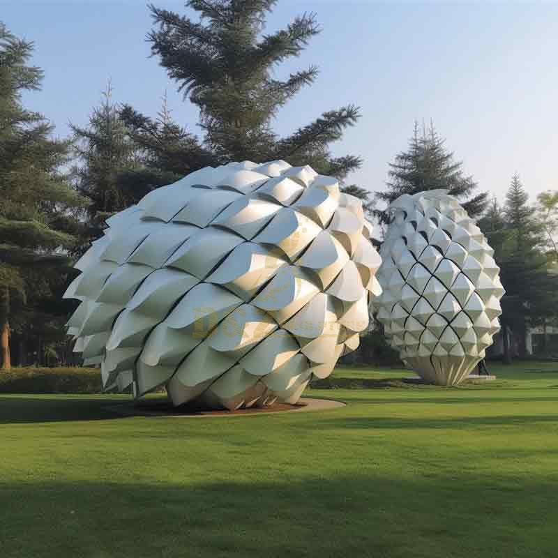 giant white metal pine cone sculptures for public landscape project