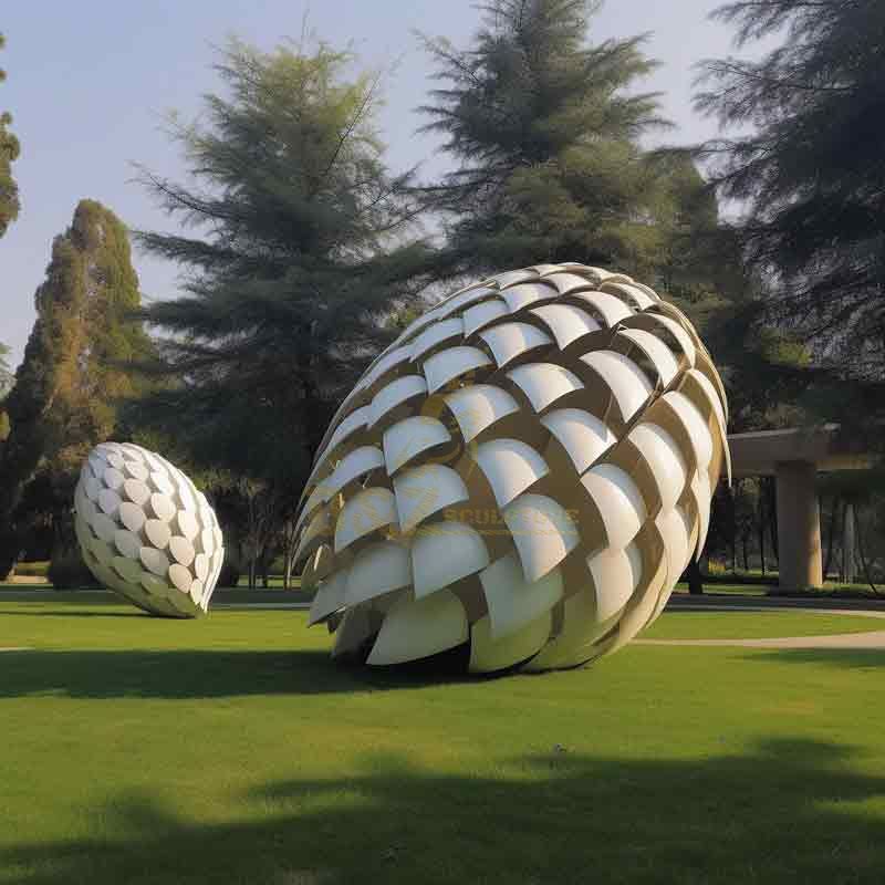 giant white metal pine cone sculptures for public landscape project