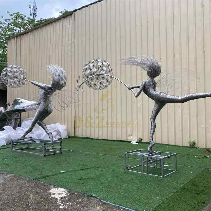 Fantasy wire fairy and dandelion garden sculptures for sale