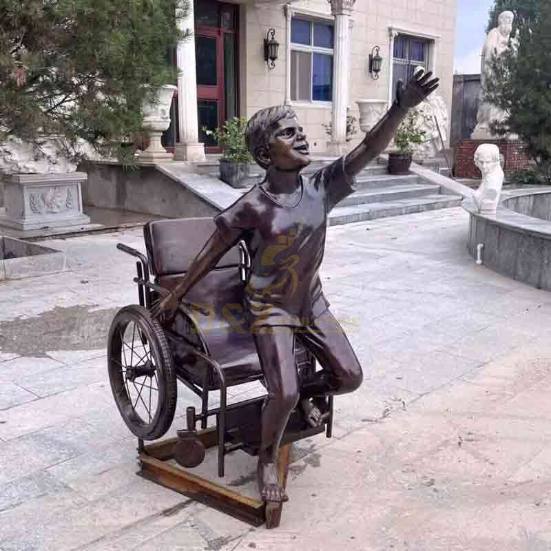 Boy in wheelchair bronze statue custom figure statue DZ-572