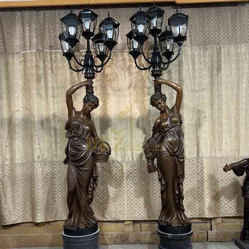 Pair of bronze lady statue floor lamps