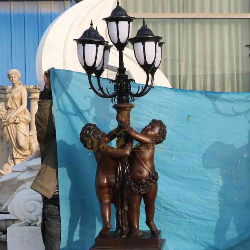 Bronze child statue lamp