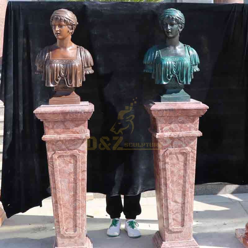 Pair of female colorful vintage bronze bust statues on stone pedestal