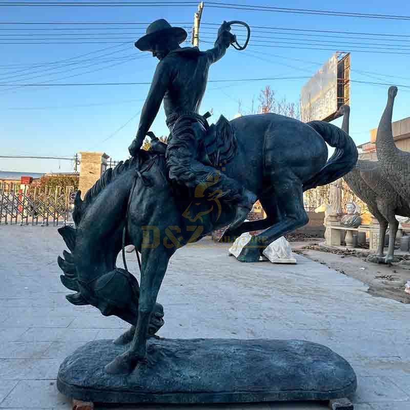 vintage cowboy statue