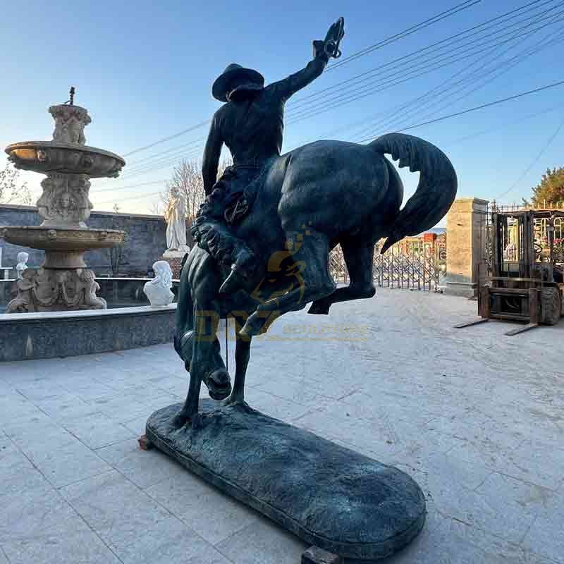 bronze cowboy horse statue