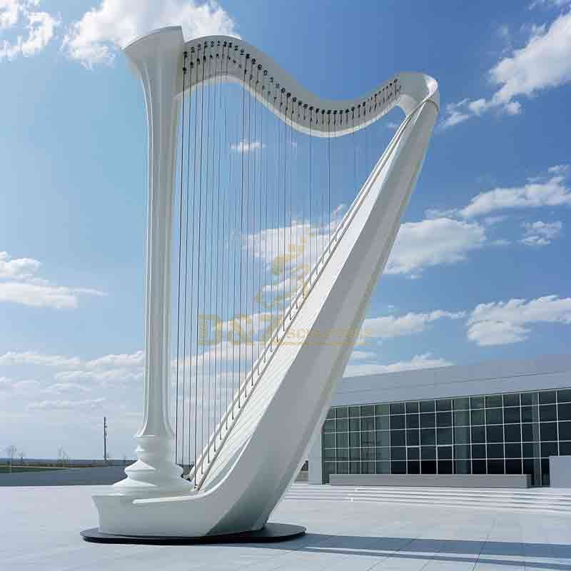 Large harp sculpture in city square, public art landmark