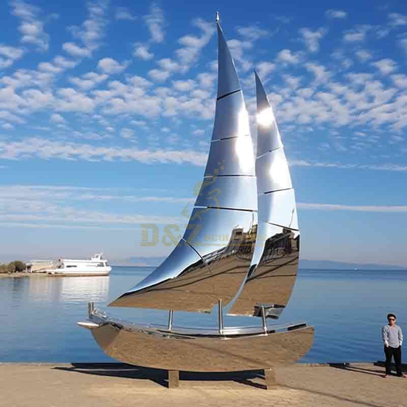 mirror stainless steel sailboat sculpture