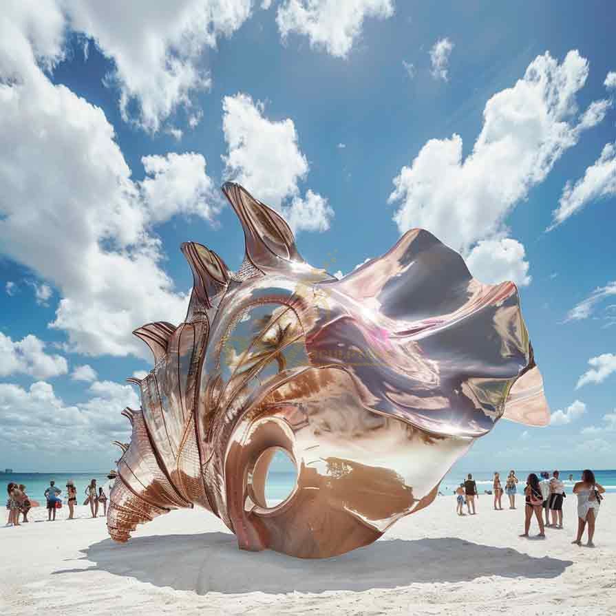 Large abstract metal conch shell sculpture on beach DZ-490