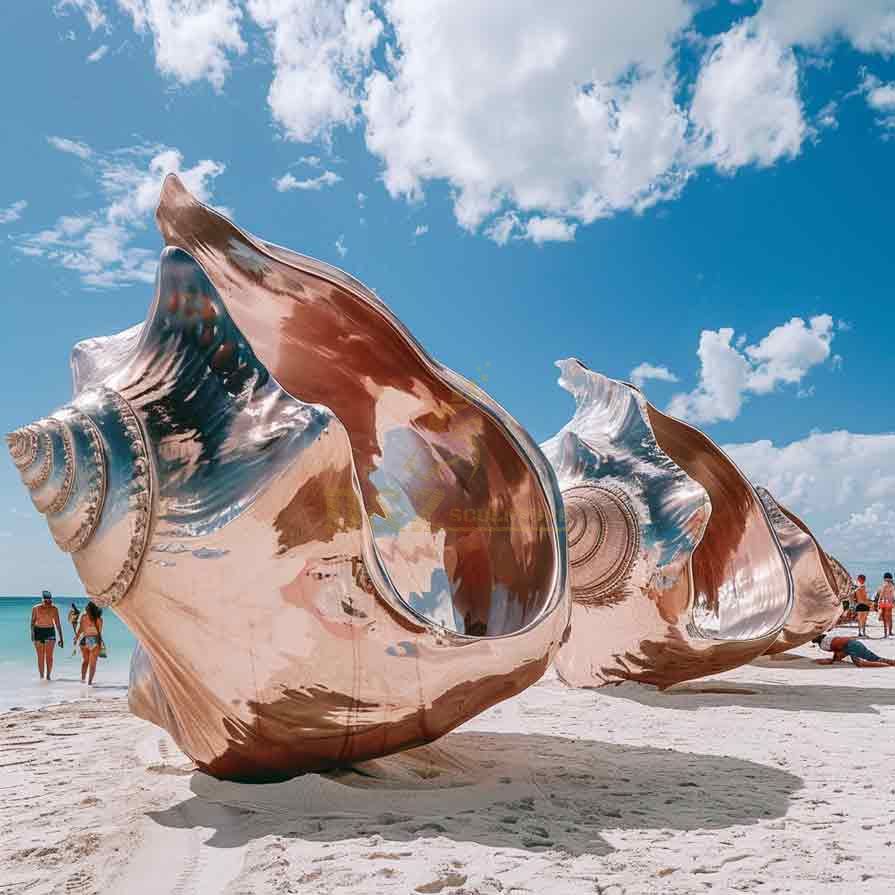 Large abstract metal conch shell sculpture on beach DZ-490