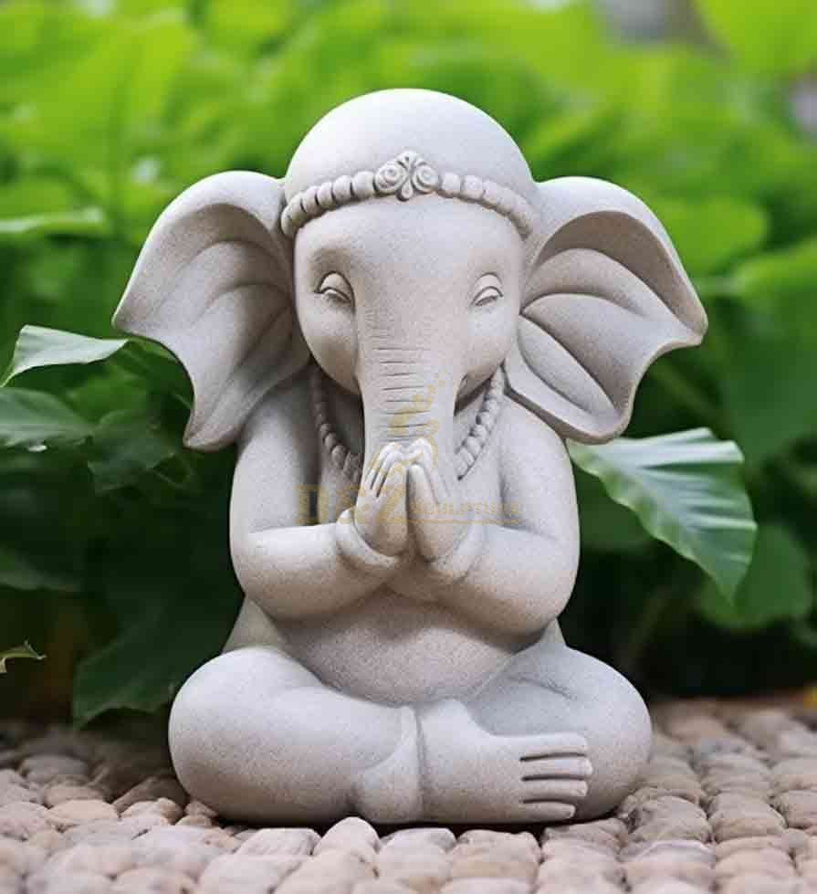 Yoga meditating elephant statue