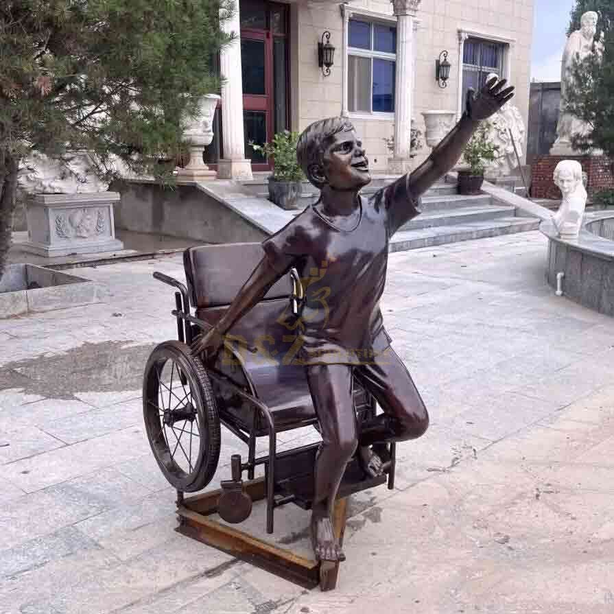 Boy in wheelchair bronze statue custom figure statue DZ-572