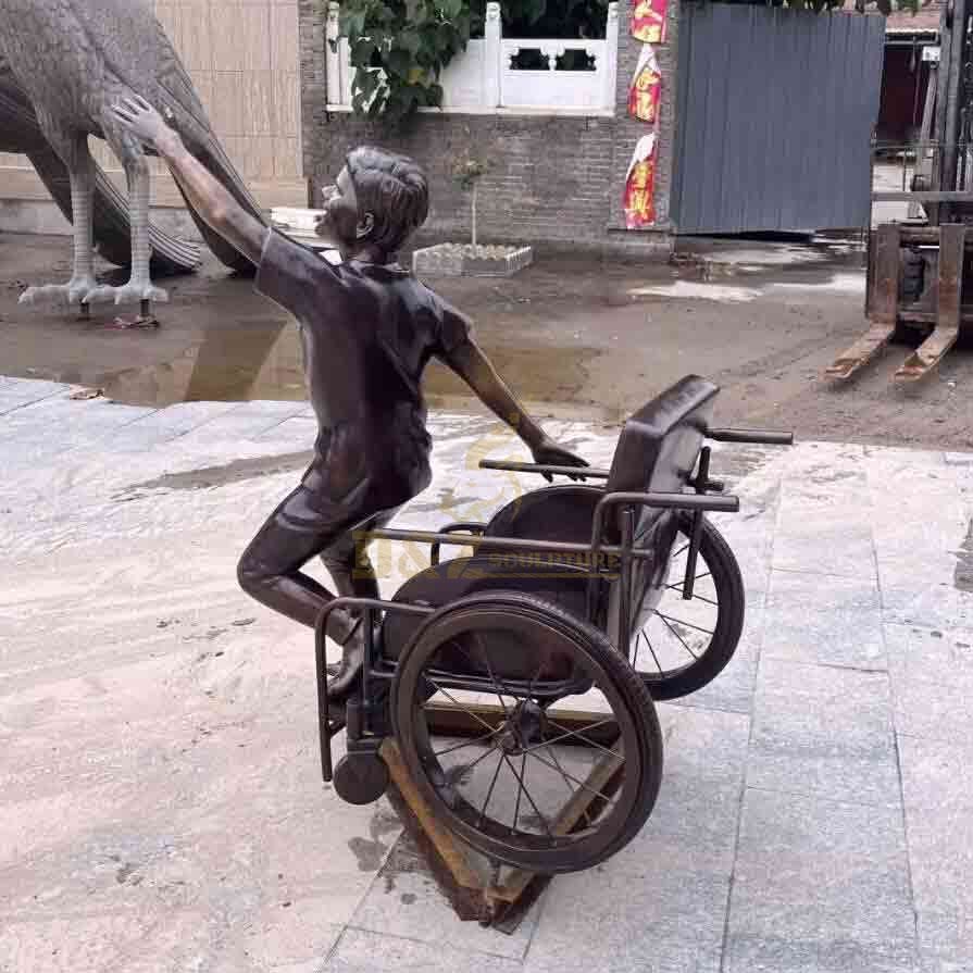 Boy in wheelchair bronze statue custom figure statue DZ-572