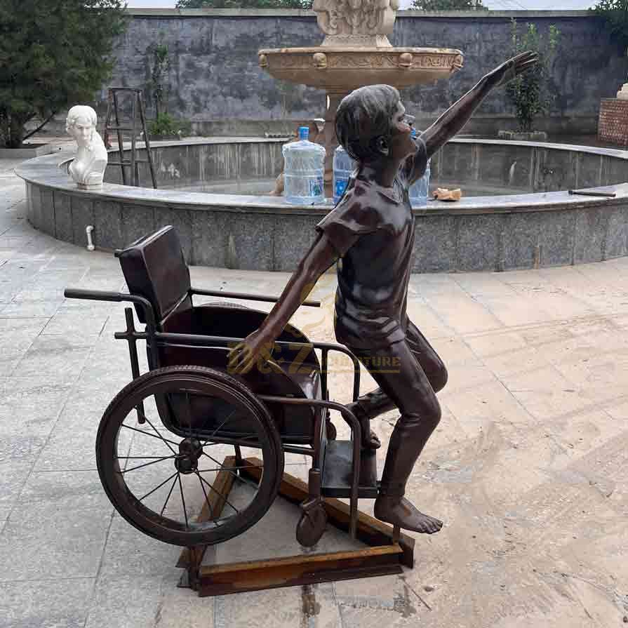 Boy in wheelchair bronze statue custom figure statue DZ-572