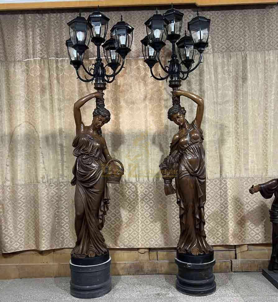 Pair of indoor bronze lady statue floor lamps