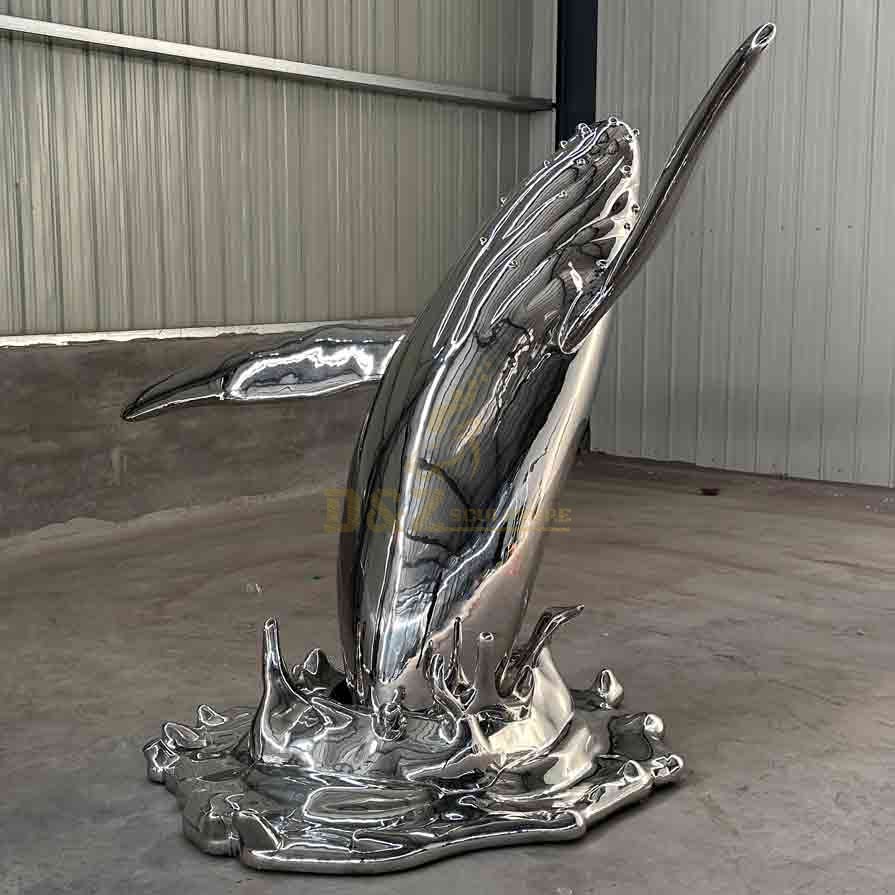 Swimming whale sculpture