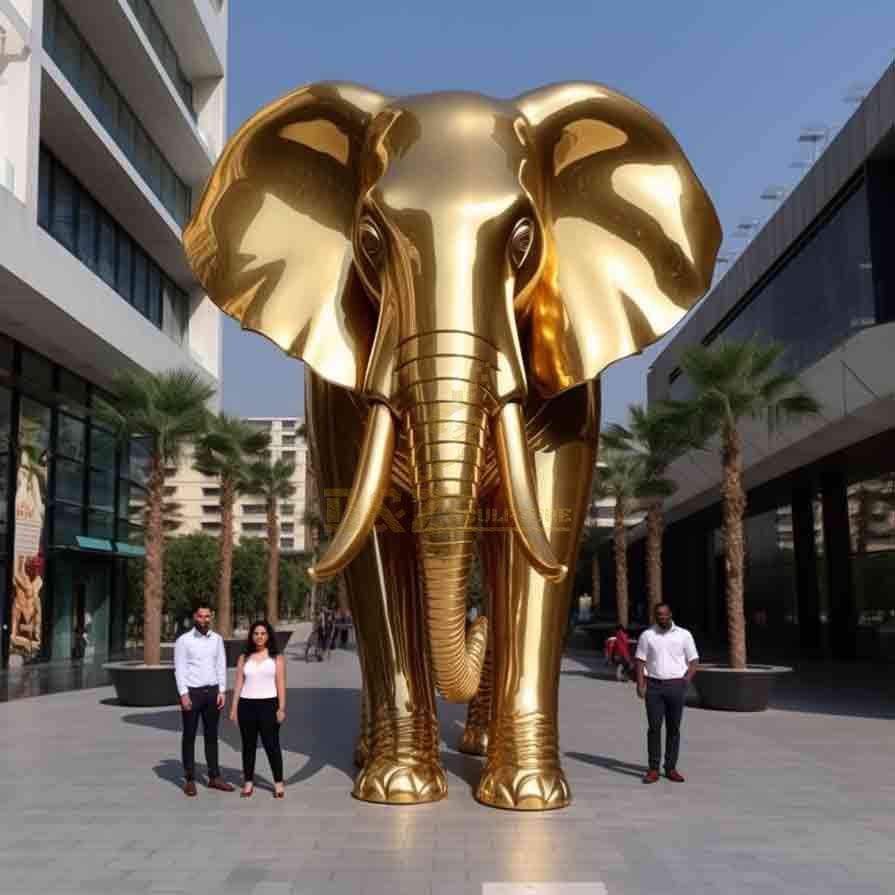 Polished large golden elephant statue in the neighborhood