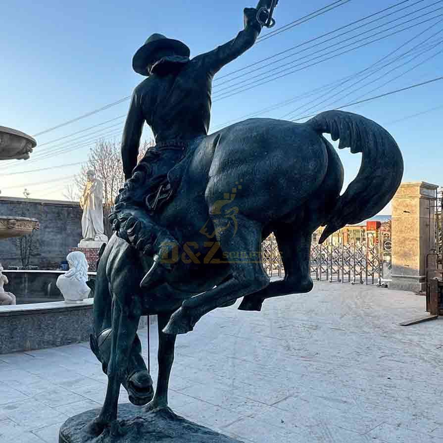 bronze cowboy statue remington