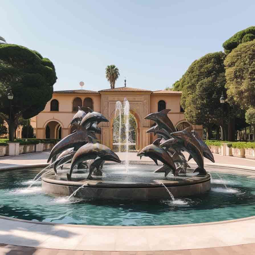 Bronze dolphin pool statues