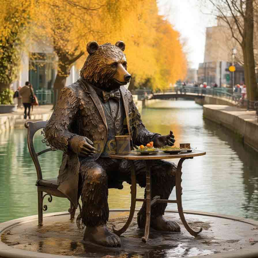 Mr. Bear leisurely drinking afternoon tea - bronze bear statue