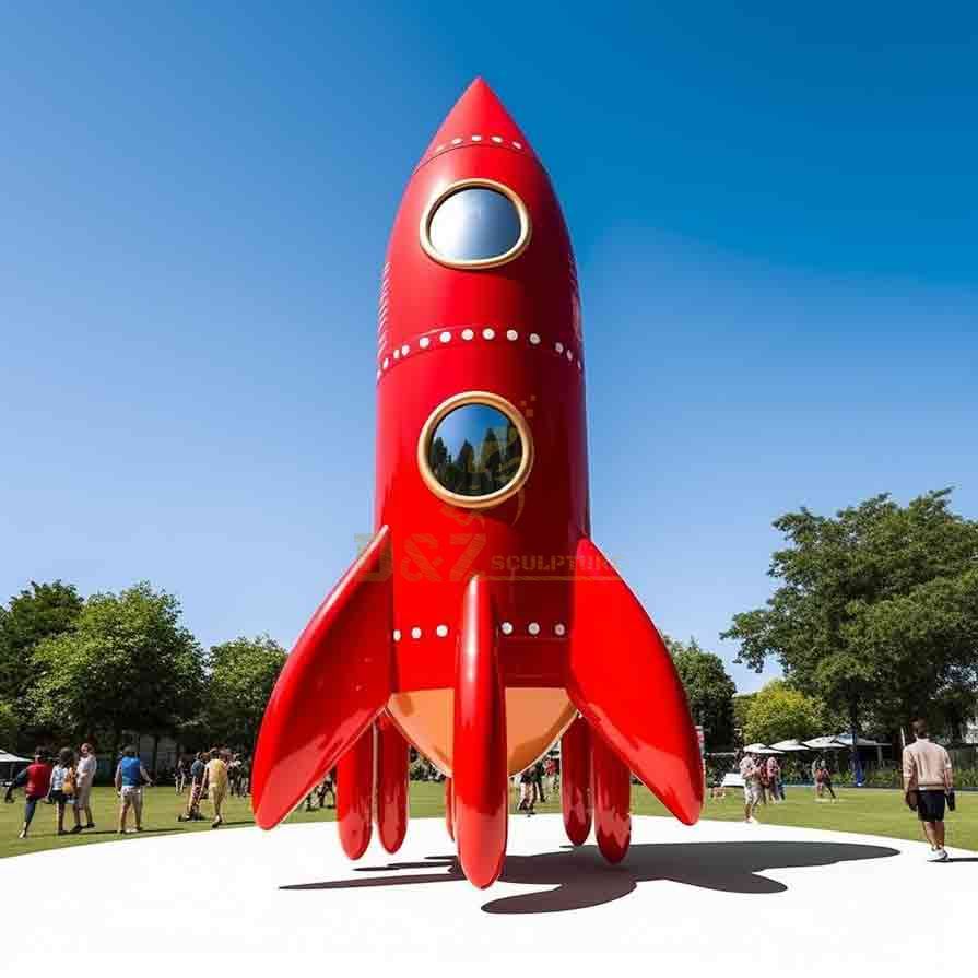 Large red cartoon metal rocket sculpture playground decor