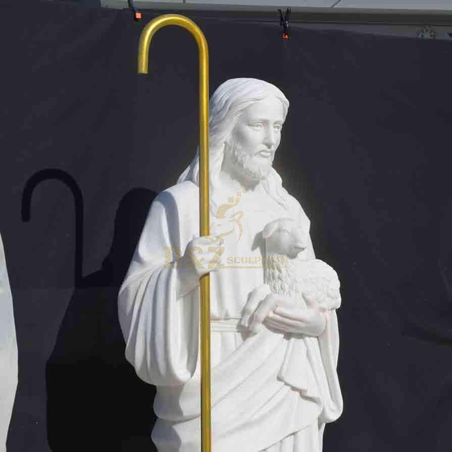 Side view - white marble Jesus and goat statue