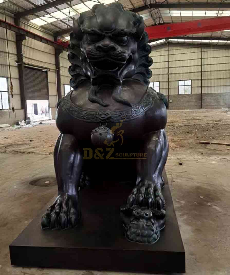 Lioness, stepping on lion cub, large bronze lion statue for sale