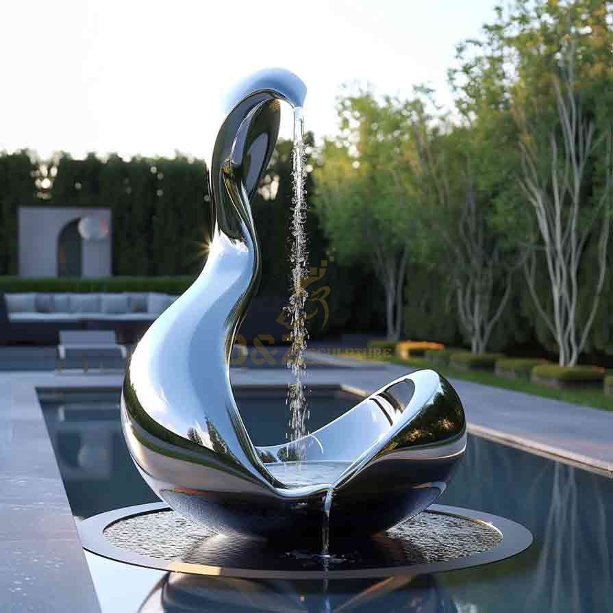 modern outdoor fountain - stainless steel fountain - organic shapes